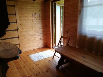 Фото номера Двухместный номер с 1 кроватью и патио Кемпинги Iecupes wooden cabin with view to river г. Иецава 12