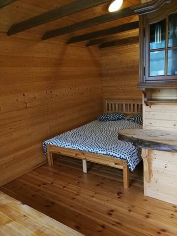 Фото номера Двухместный номер с 1 кроватью и патио Кемпинги Iecupes wooden cabin with view to river г. Иецава 9