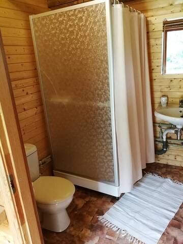 Фото номера Двухместный номер с 1 кроватью и патио Кемпинги Iecupes wooden cabin with view to river г. Иецава 15