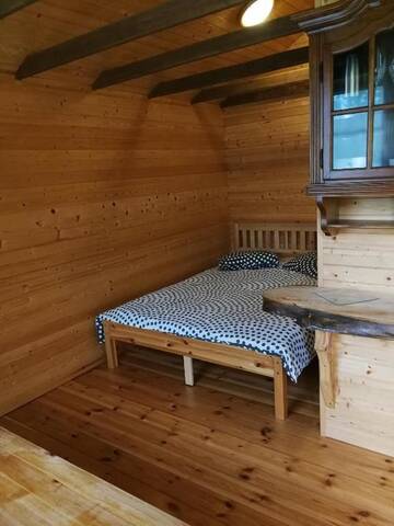 Фото номера Двухместный номер с 1 кроватью и патио Кемпинги Iecupes wooden cabin with view to river г. Иецава 23