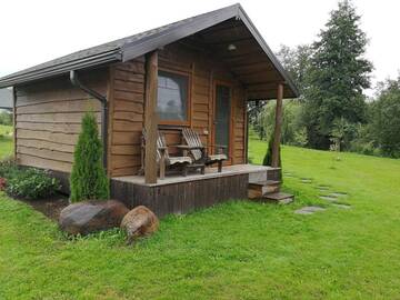 Фото номера Двухместный номер с 1 кроватью и патио Кемпинги Iecupes wooden cabin with view to river г. Иецава 18