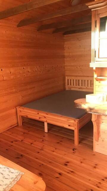 Фото номера Двухместный номер с 1 кроватью и патио Кемпинги Iecupes wooden cabin with view to river г. Иецава 24