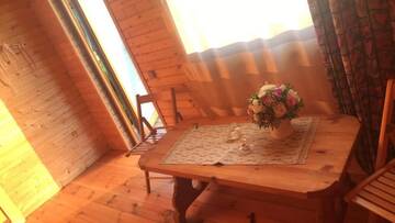 Фото номера Двухместный номер с 1 кроватью и патио Кемпинги Iecupes wooden cabin with view to river г. Иецава 22