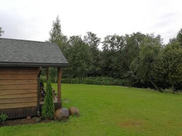 Фото номера Двухместный номер с 1 кроватью и патио Кемпинги Iecupes wooden cabin with view to river г. Иецава 19