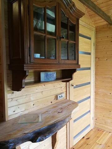 Фото номера Двухместный номер с 1 кроватью и патио Кемпинги Iecupes wooden cabin with view to river г. Иецава 27